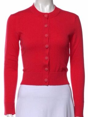 Authentic CHANEL Red Button up sweater
Little gold CC on button super cute